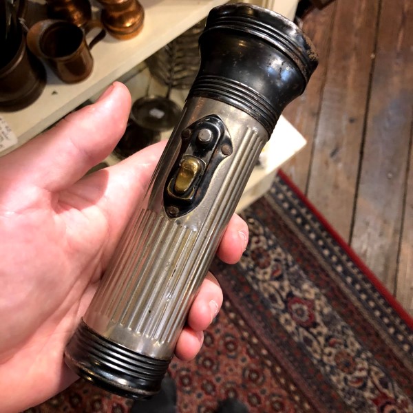 when was the flashlight invented